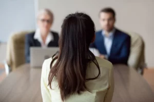 a woman looking at a group of people