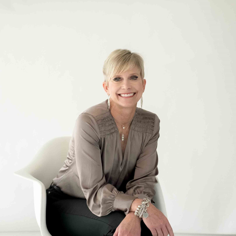 a woman sitting in a chair
